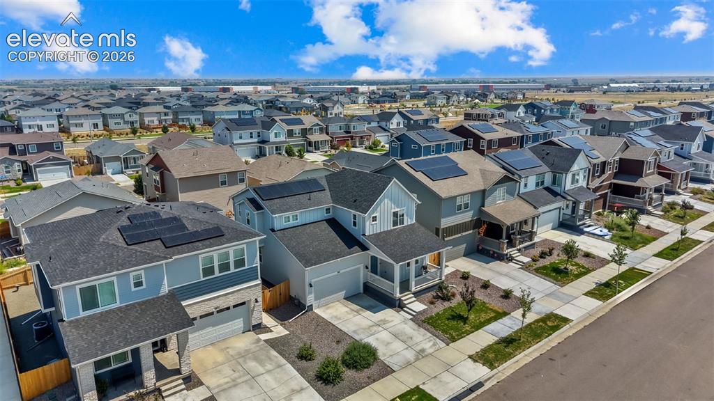 Image 28 of 37: Residential neighborhood featuring a variety of two-story homes with attach