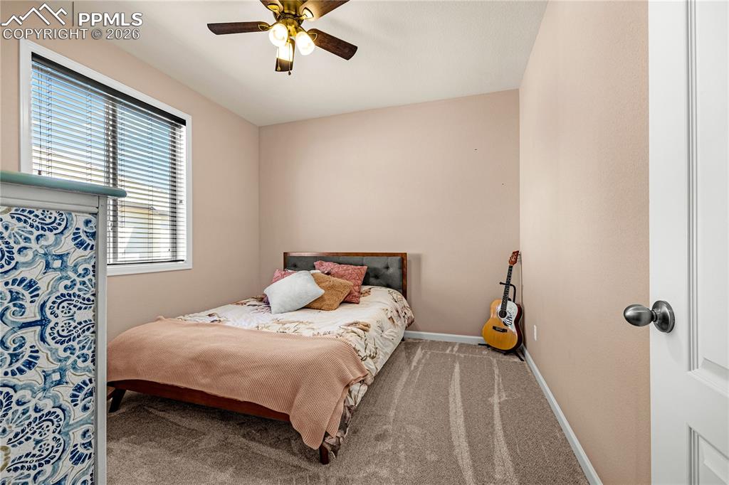 Image 27 of 37: main level bedroom