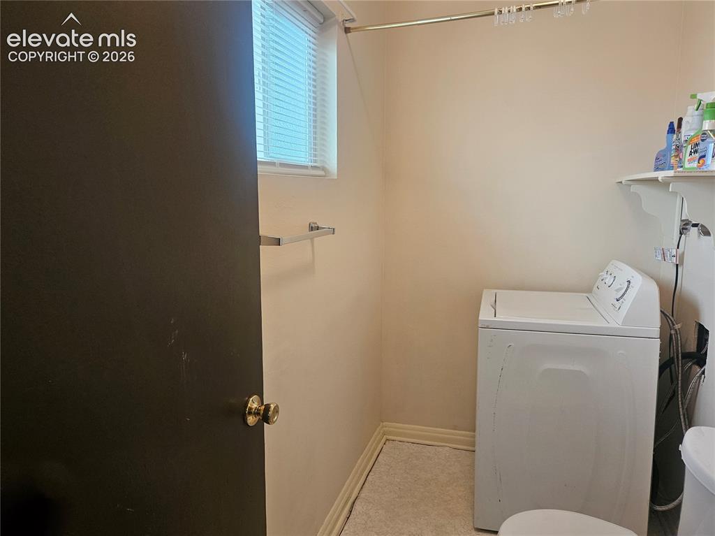 Image 30 of 44: 1/2 Bath, out of the Bonus Room. Clothes washer