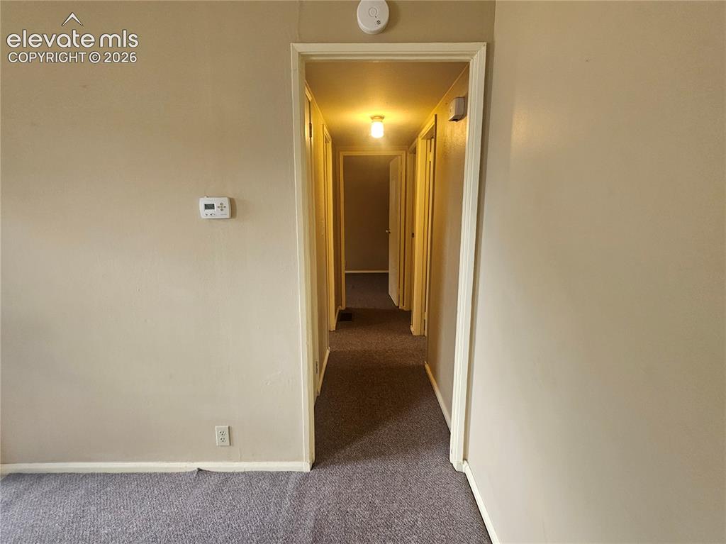 Image 9 of 44: From L.R. toward the hallway and bedrooms