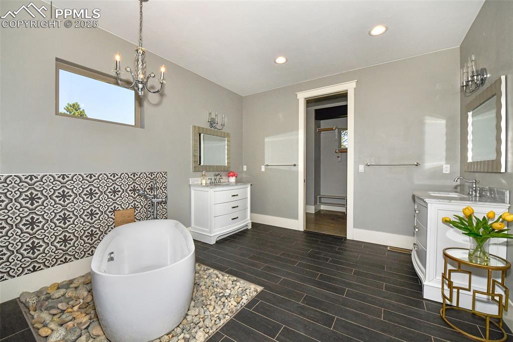 Image 16 of 50: Master Bathroom