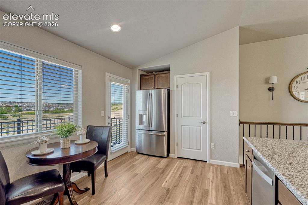 Image 12 of 47: Start your morning in the bright breakfast nook with convenient access to t