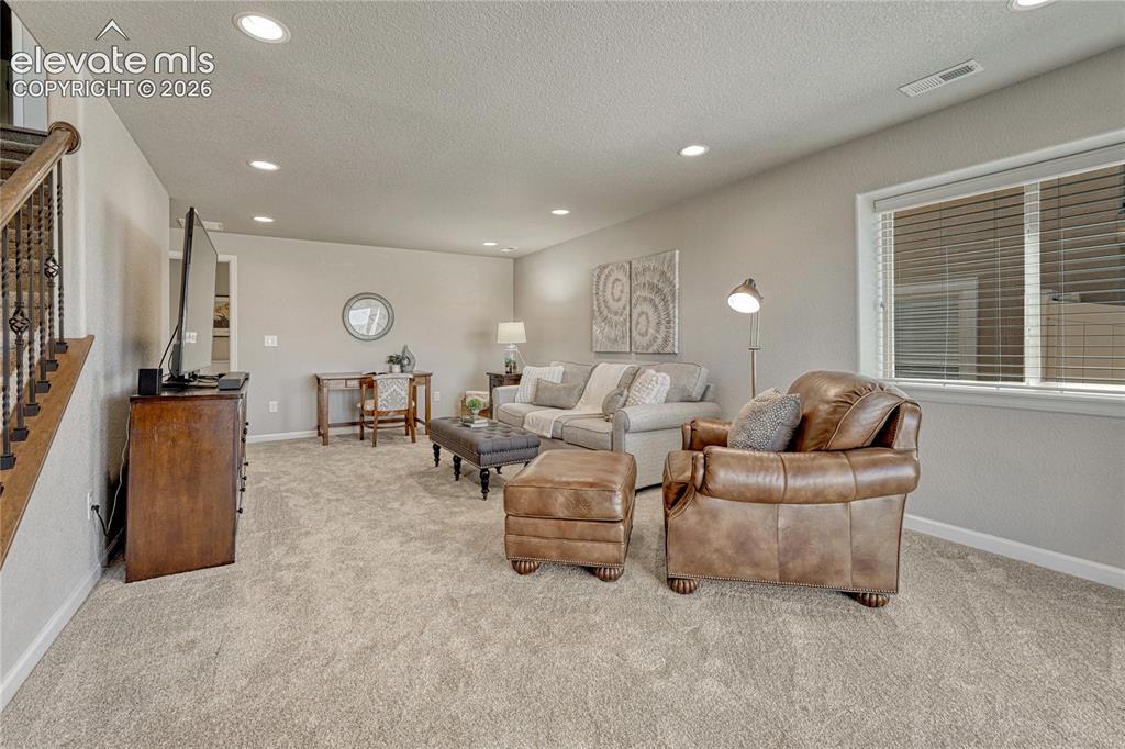 Image 24 of 47: The finished basement expands the home