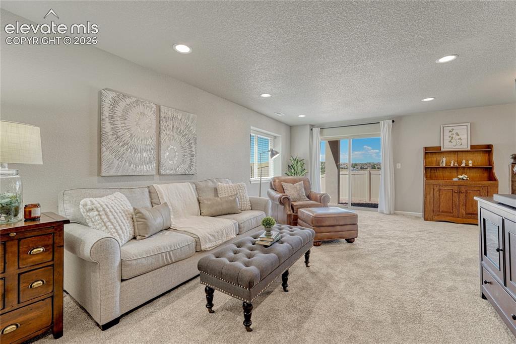 Image 33 of 47: The finished basement creates valuable additional living space with room to
