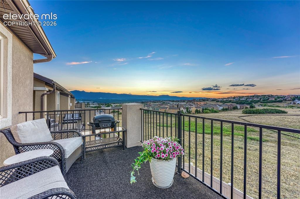 Image 34 of 47: Take in breathtaking mountain views and unforgettable sunsets from this ele