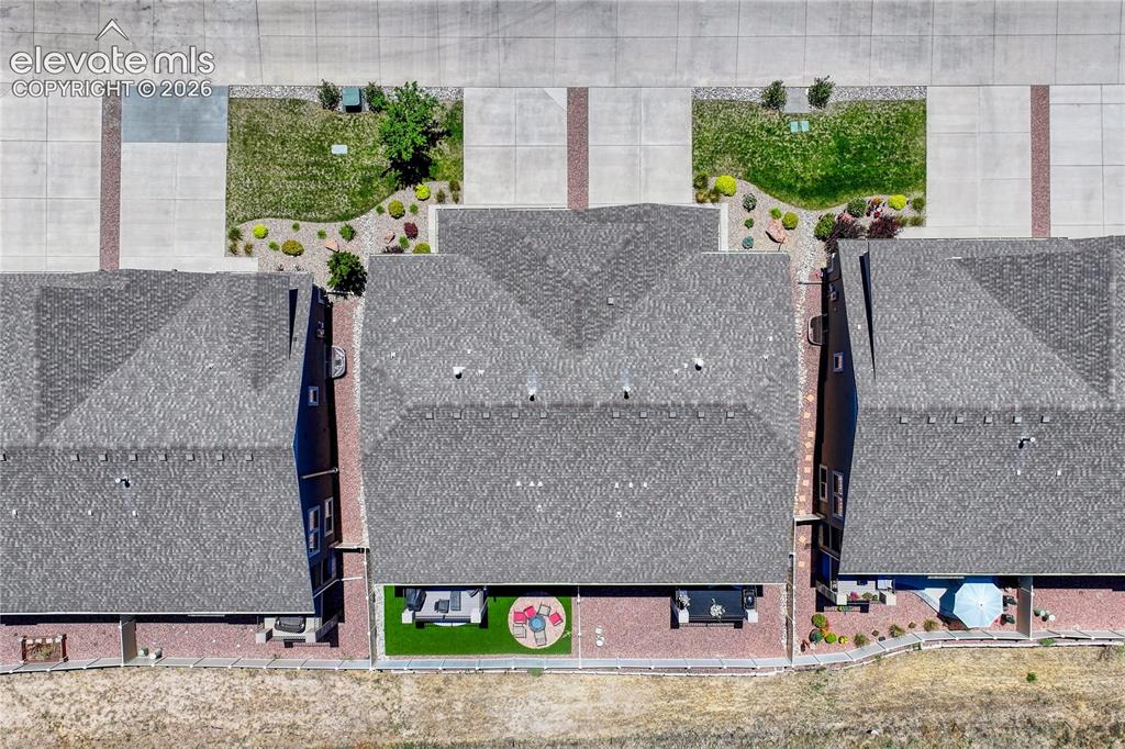 Image 43 of 47: Aerial views showcase the thoughtful property layout, outdoor living spaces