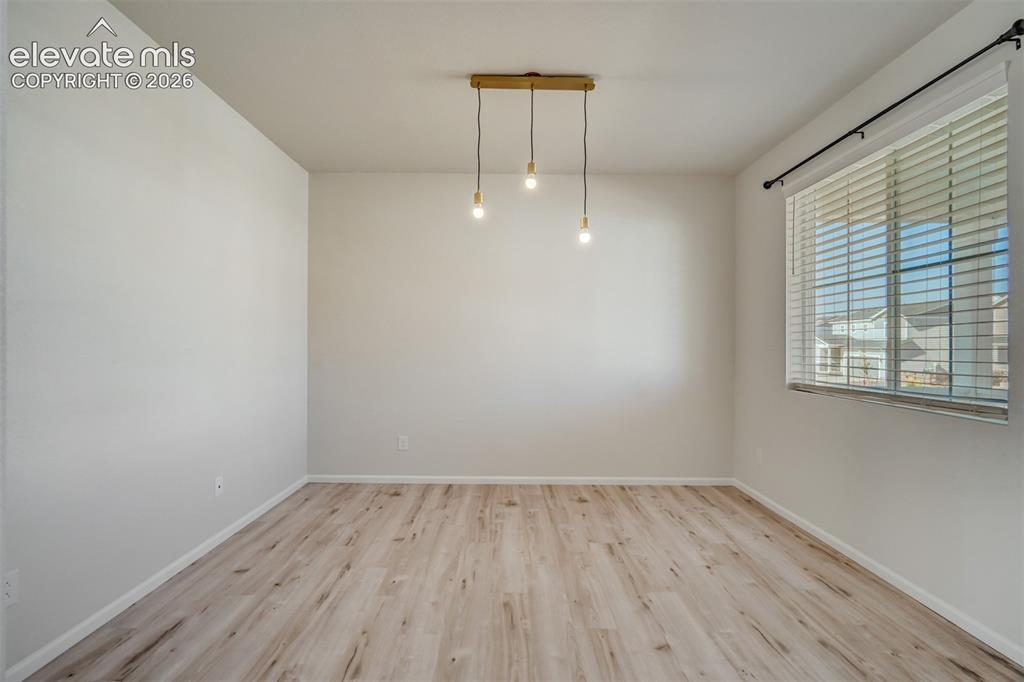 Image 16 of 41: Office or formal dining 
