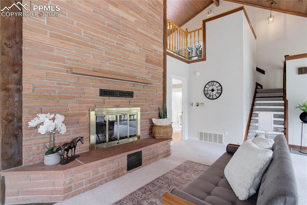 Image 7 of 33: Stacked stone fireplace