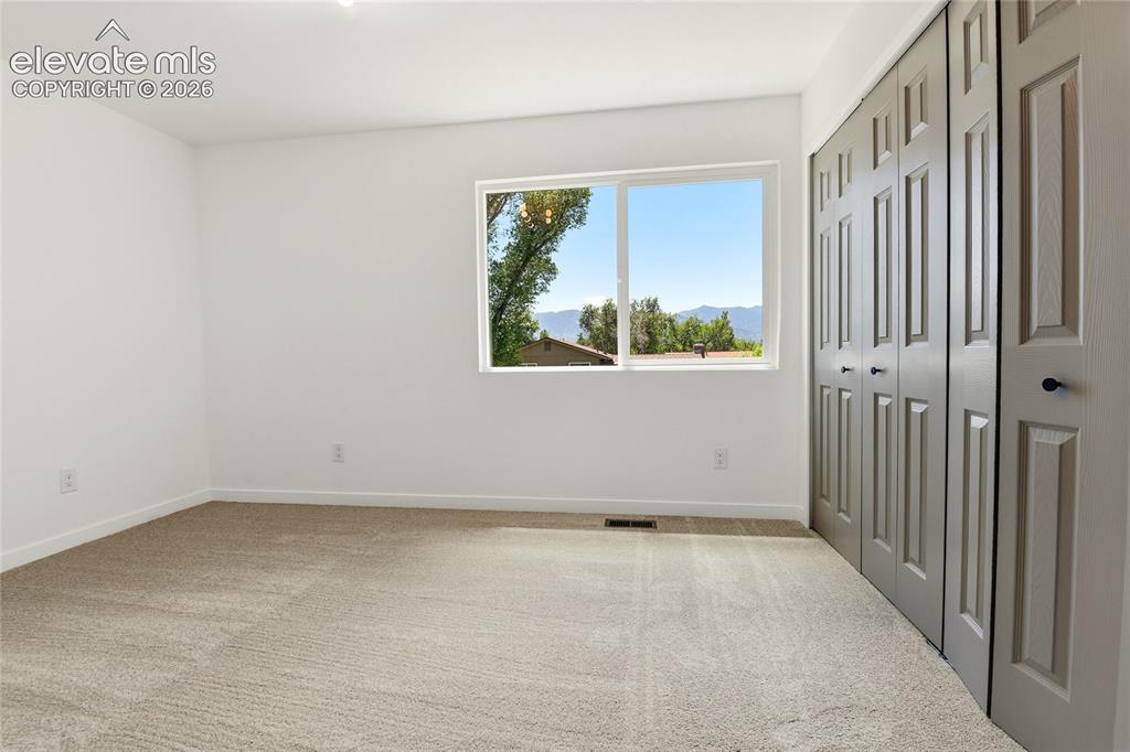 Image 15 of 26: Bedroom