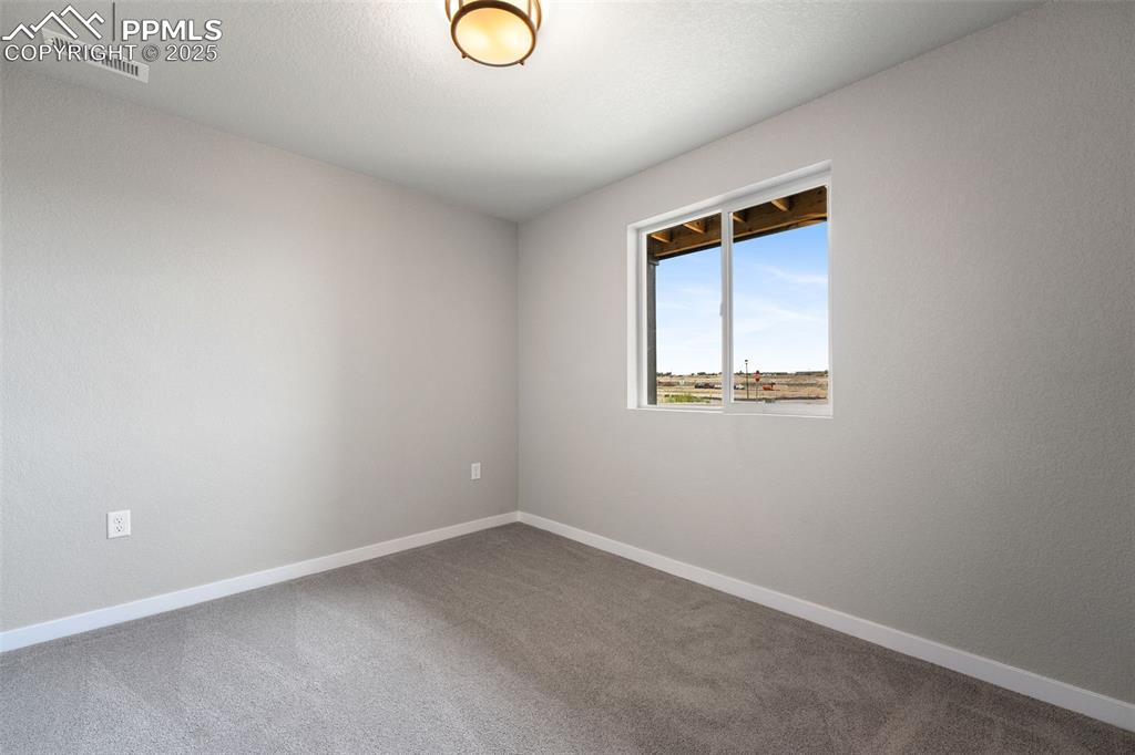 Image 18 of 48: Bedroom