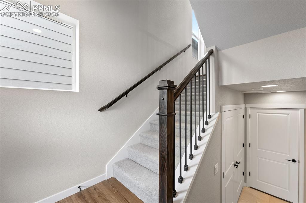 Image 20 of 48: Stairs to main level