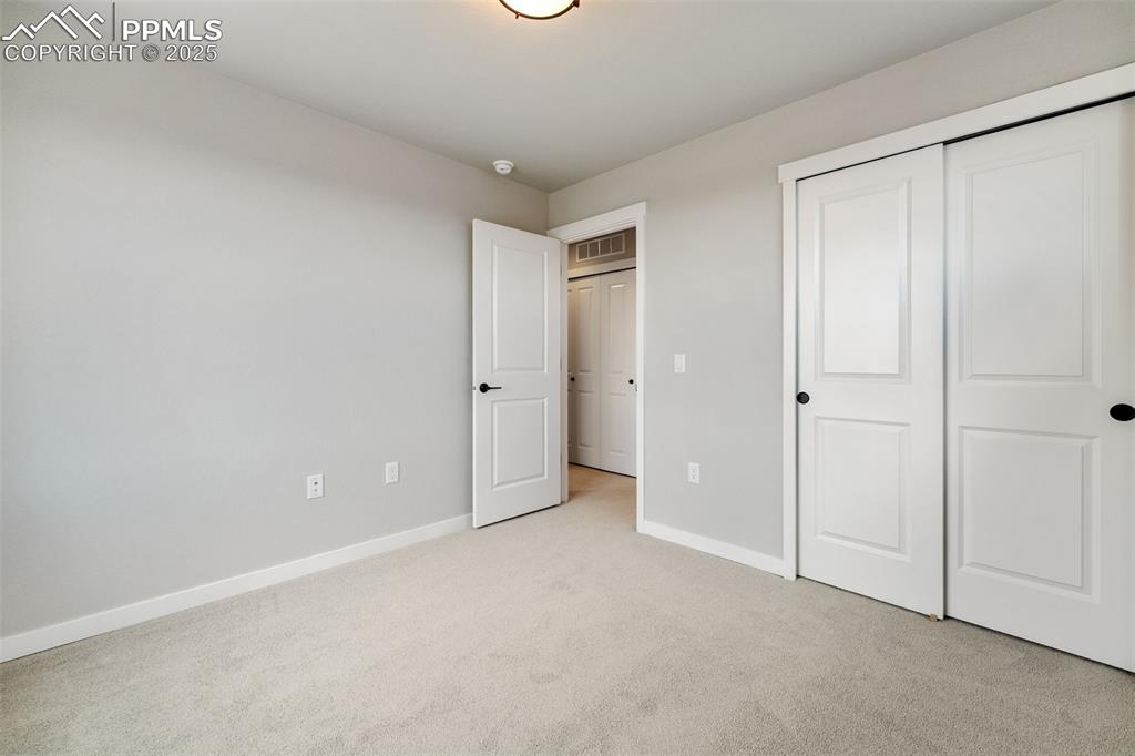 Image 33 of 48: Bedroom