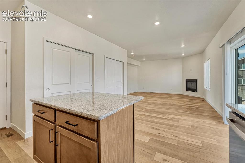 Image 12 of 50: Attached two-car garage enters the kitchen