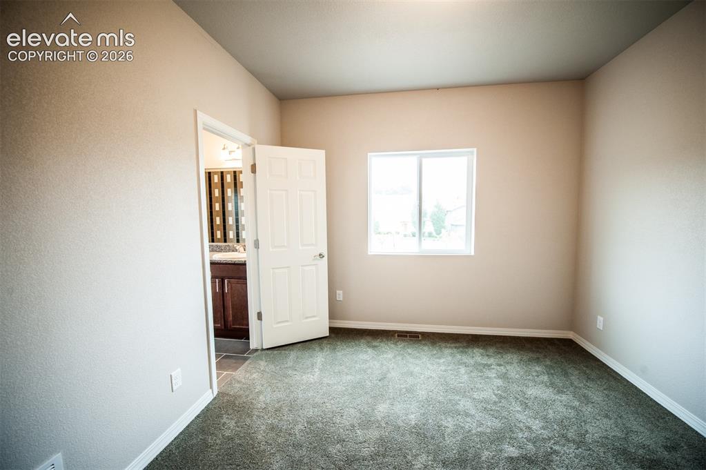 Image 18 of 29: 2nd bedroom