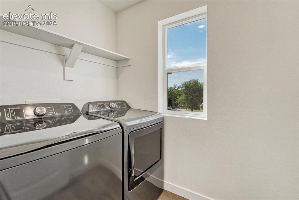 Image 35 of 50: Spacious laundry room - washer and dryer included!