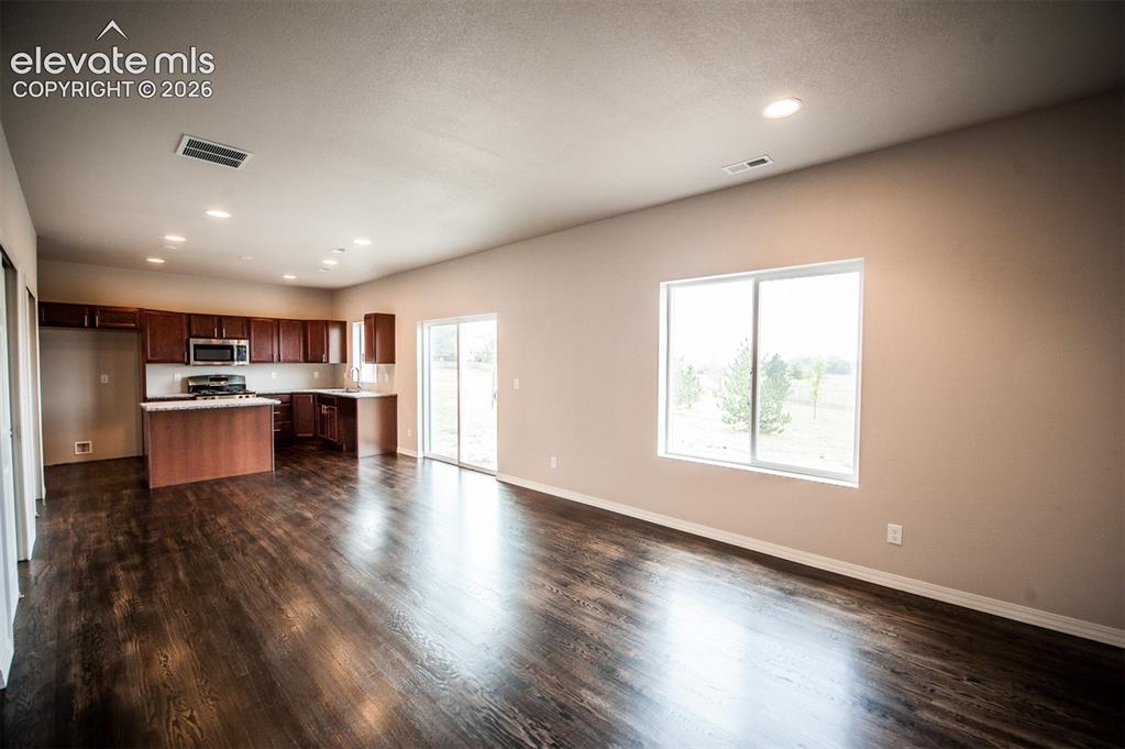 Image 5 of 29: Dining area with walk-out