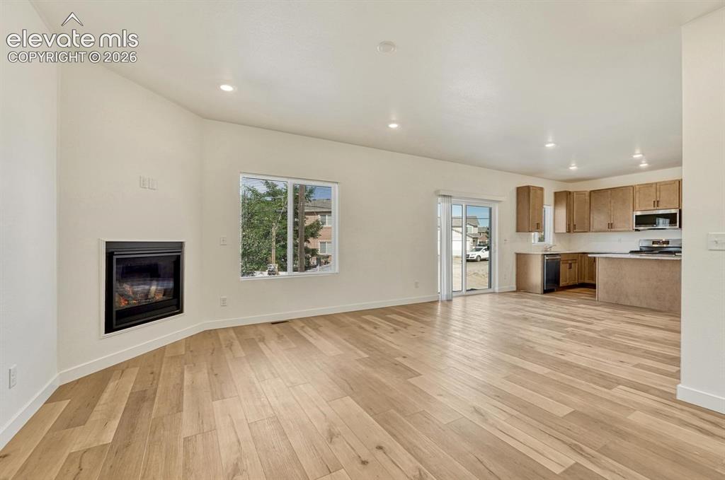 Image 5 of 50: This gorgeous open concept two-story features nine foot ceiling height on t