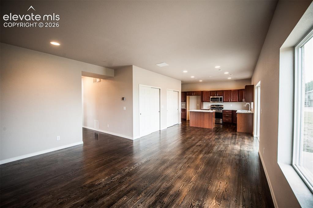 Image 9 of 29: LVP on the main level, 9ft ceilings