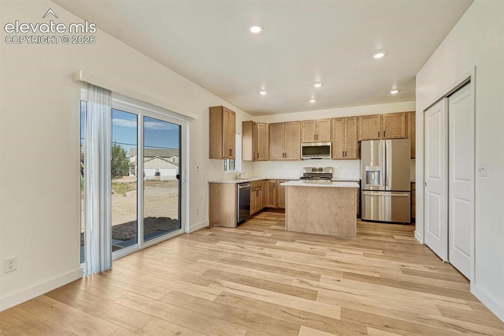 Image 9 of 50: Generous ceiling can light placement