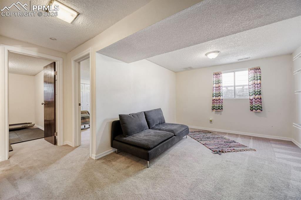 Image 15 of 30: Basement Family Room