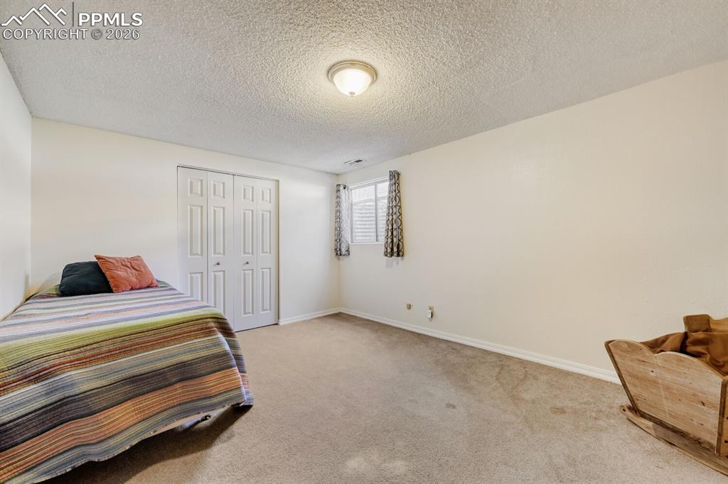 Image 19 of 30: Basement bedroom 2