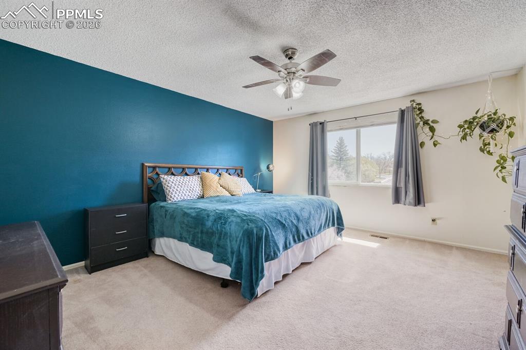 Image 20 of 30: Upstairs primary bedroom