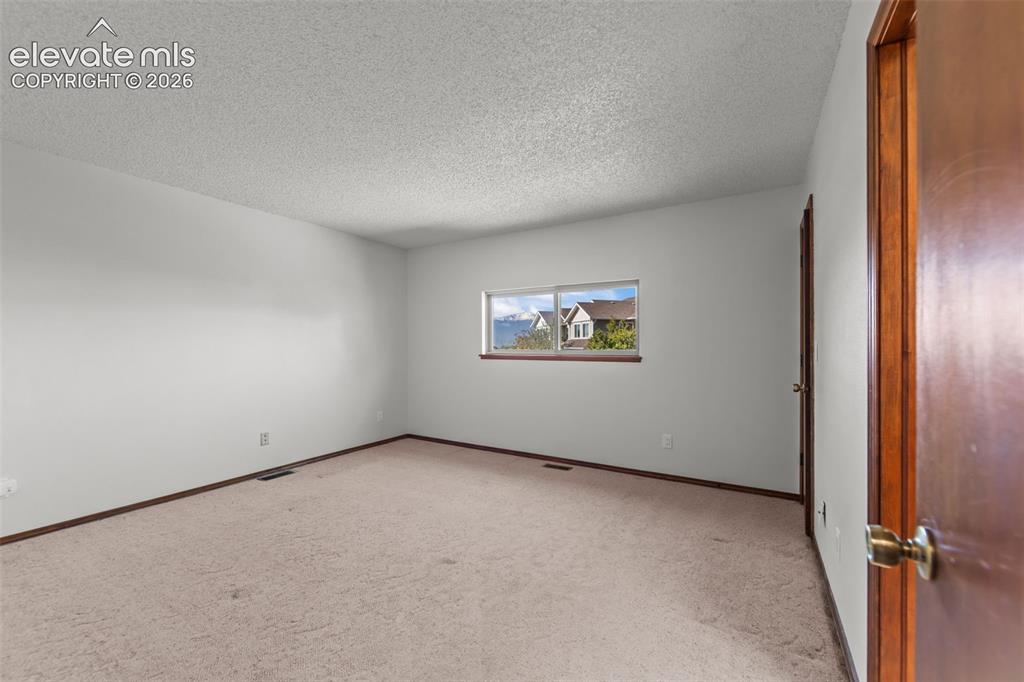 Image 7 of 22: Master Bedroom