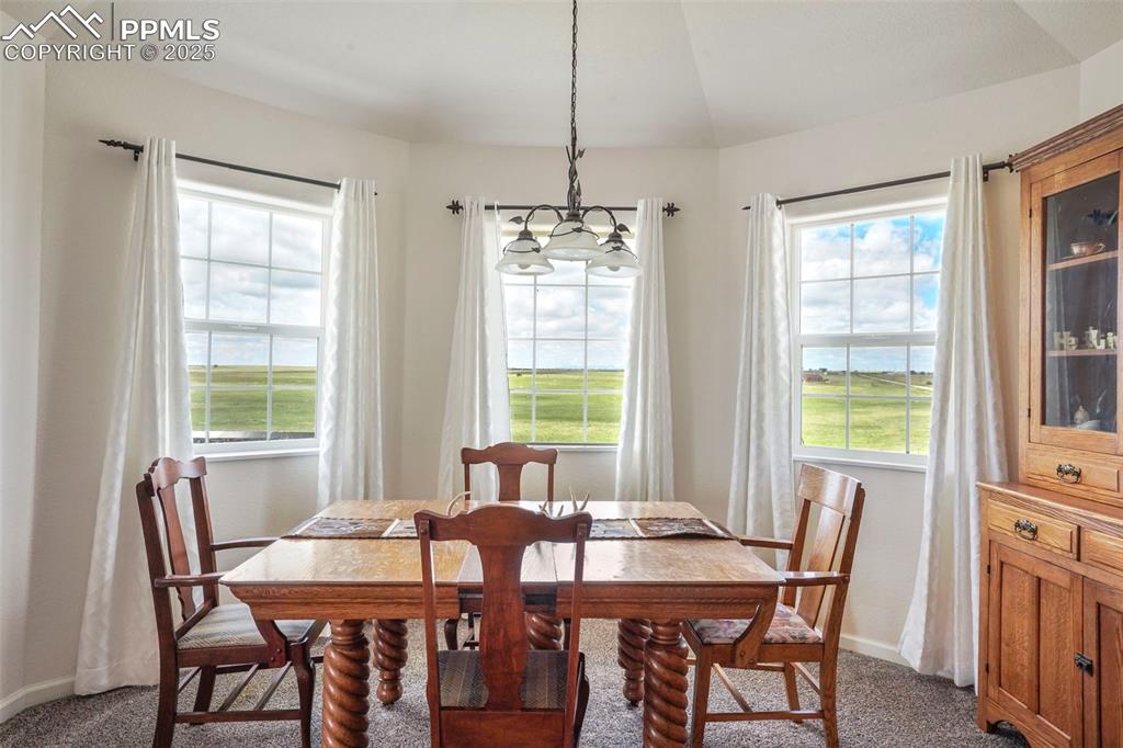 Image 13 of 50: Dining room with mountain views.