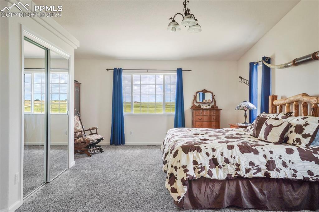 Image 19 of 50: Large with plenty of room for a king size bed.