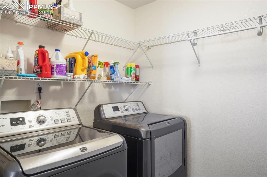 Image 30 of 50: Mian level laundry room.