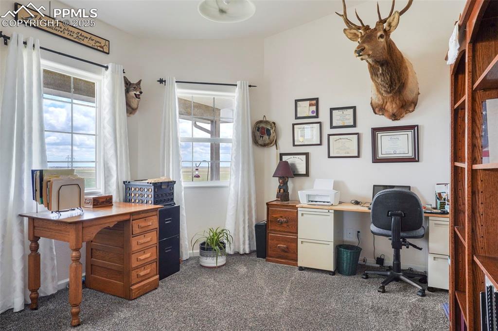 Image 9 of 50: Office or could be used as a second main level bedroom.