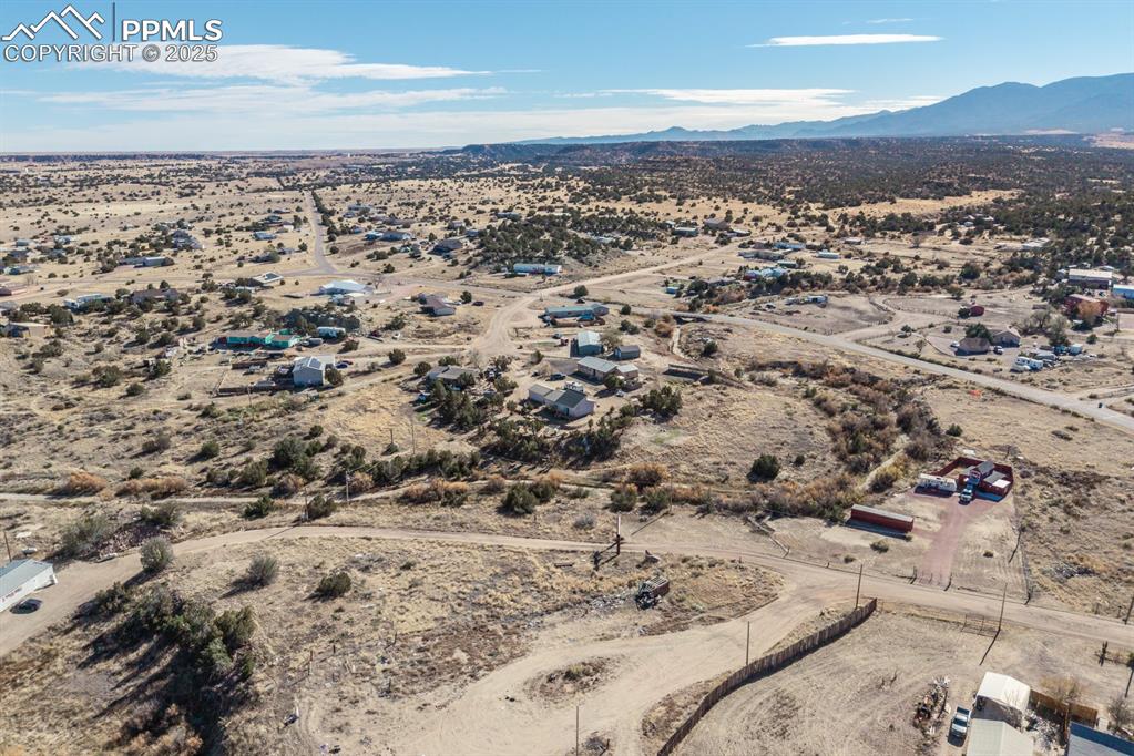 Image 13 of 50: View of property location with rural landscape and a mountainous background