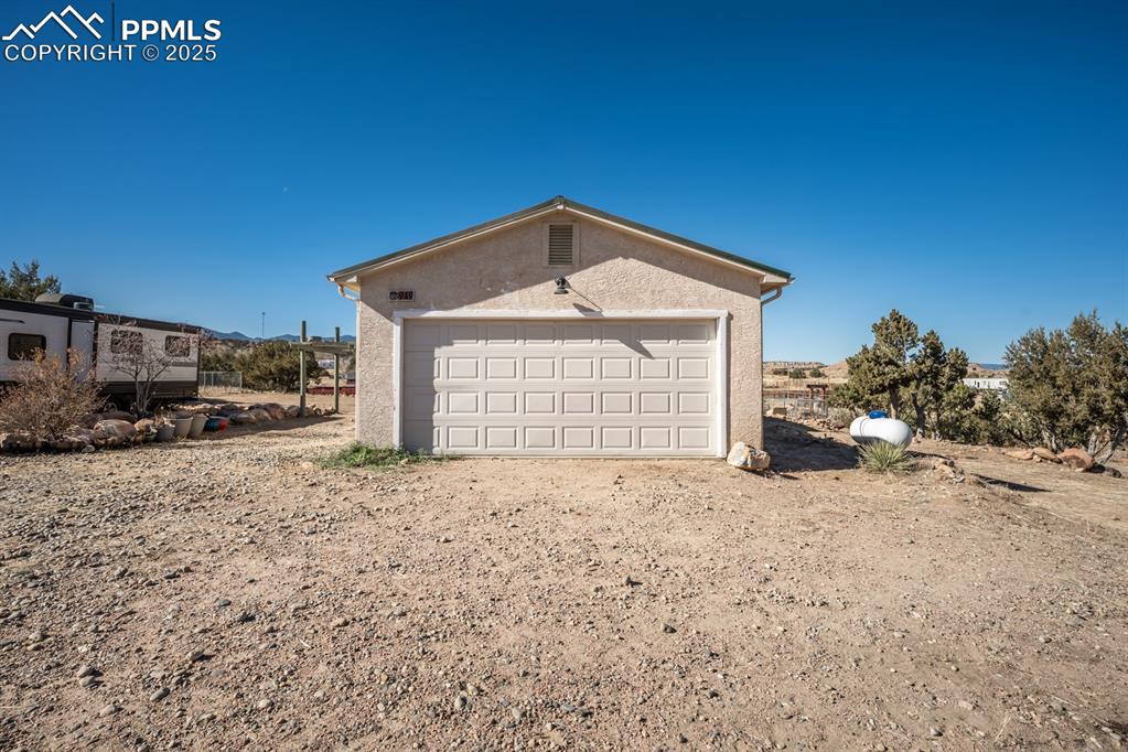 Image 34 of 50: View of detached garage