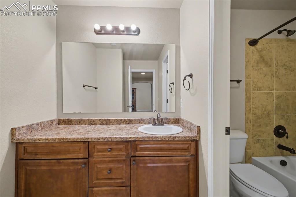 Image 31 of 42: Basement level full bathroom