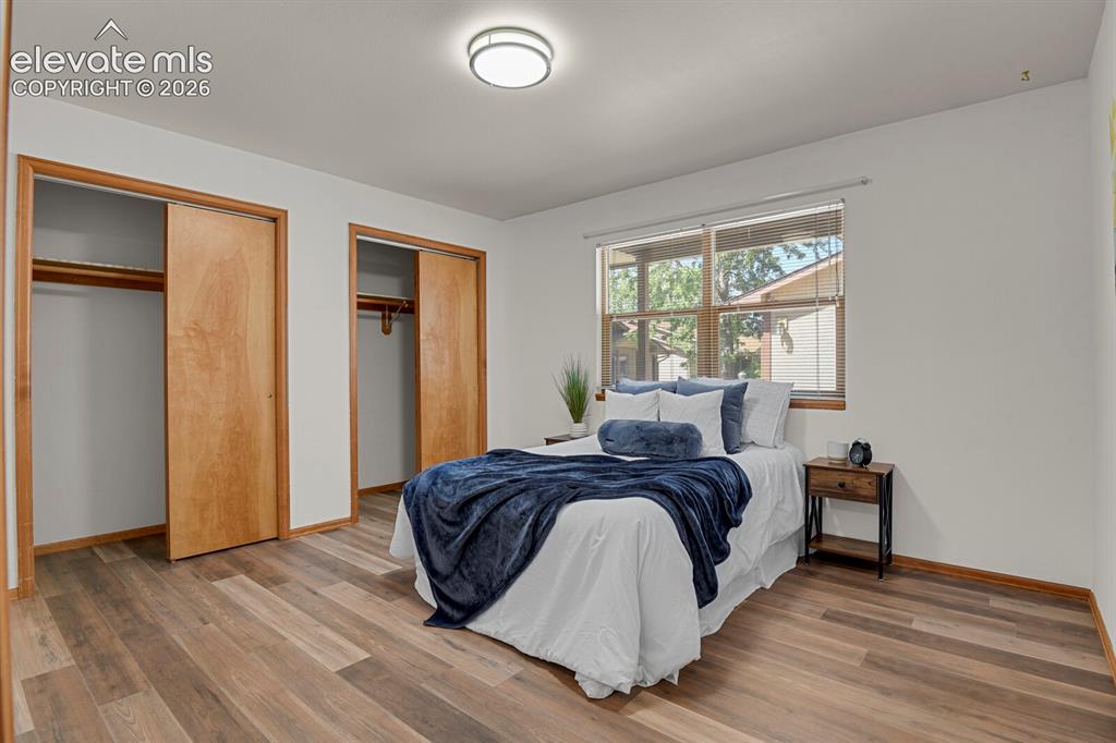 Image 11 of 19: Primary Bedroom with double closets