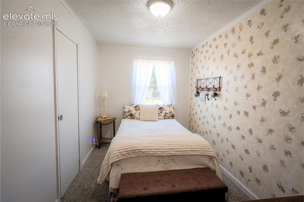 Image 11 of 19: Bedroom