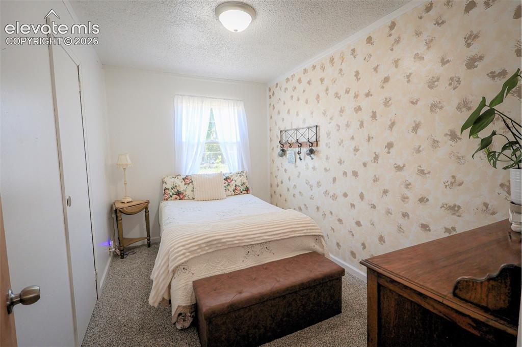 Image 12 of 19: Bedroom