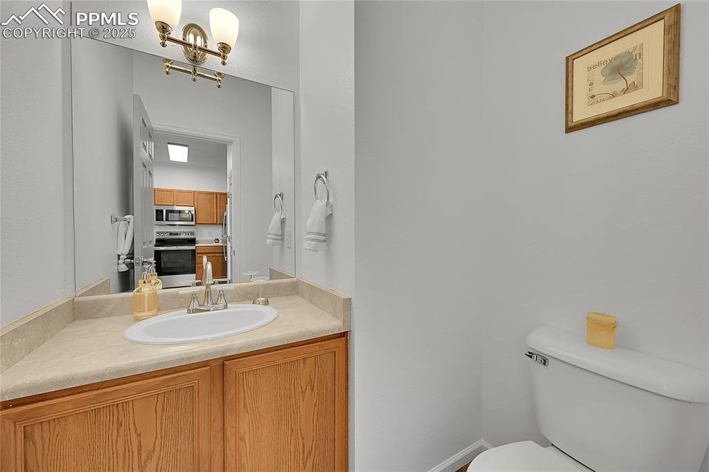 Image 13 of 31: Bathroom with vanity and toilet