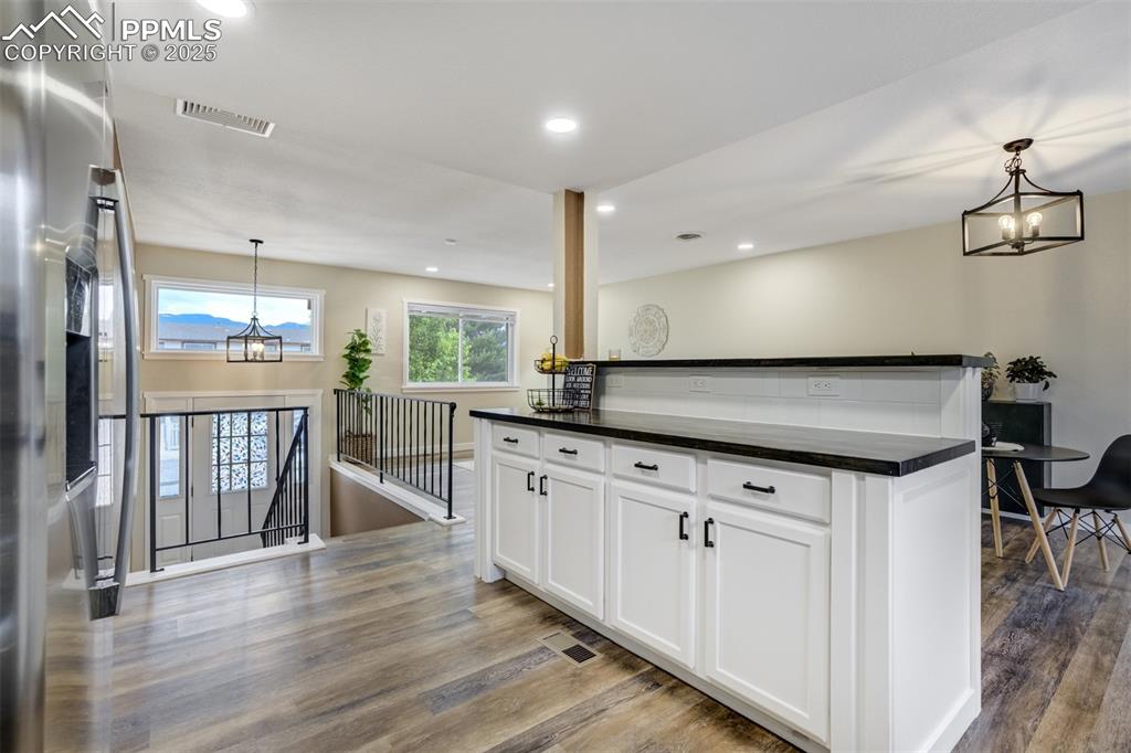 Image 13 of 47: Butcher Block Countertops - Sealed & Stained to match flooring...