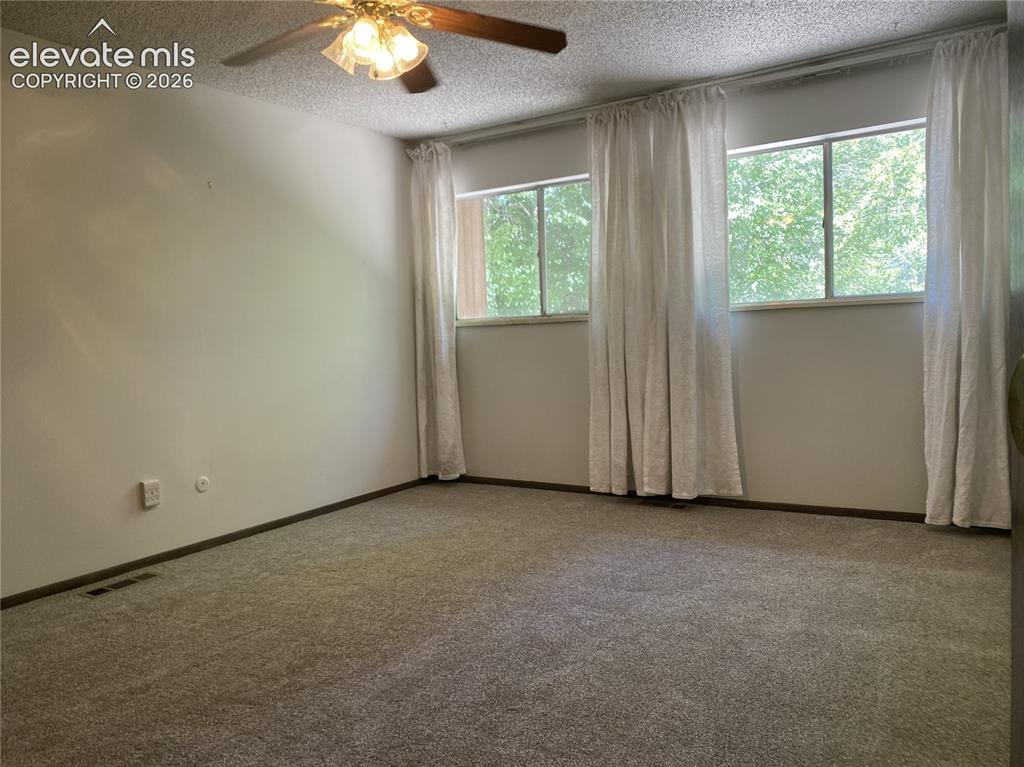 Image 21 of 25: Master Bedroom