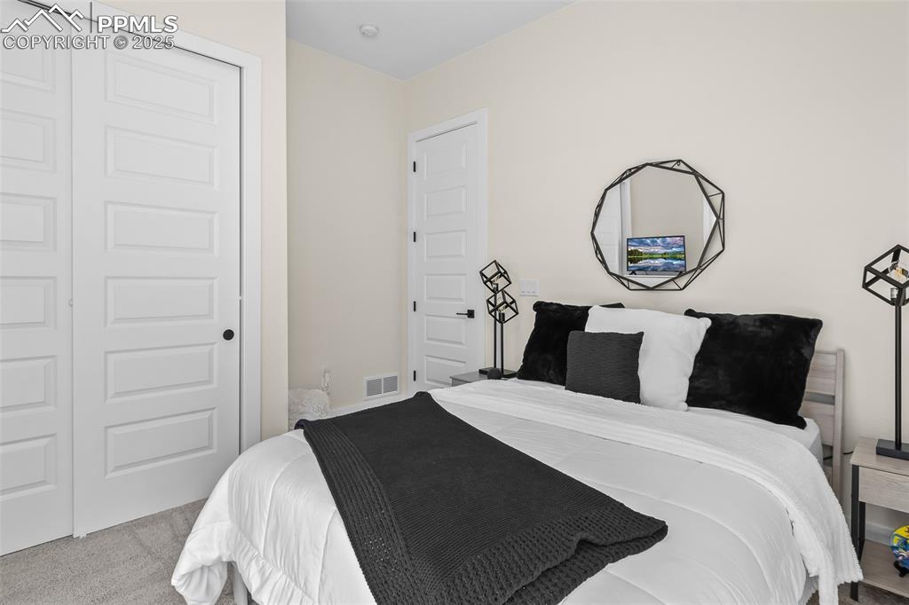 Image 10 of 49: Bedroom