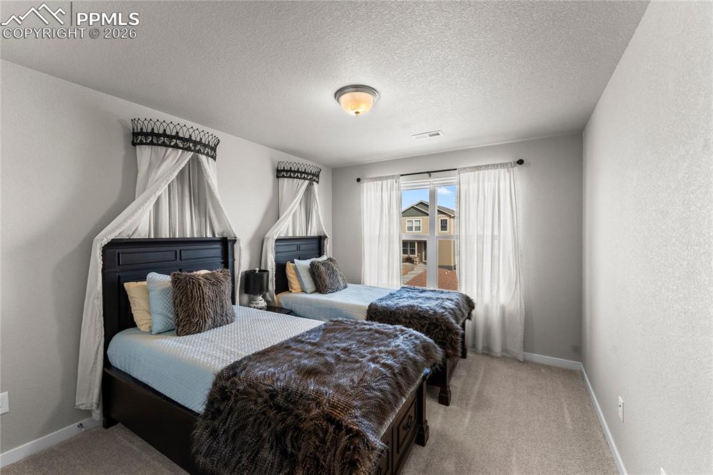 Image 23 of 46: Upstairs bedroom