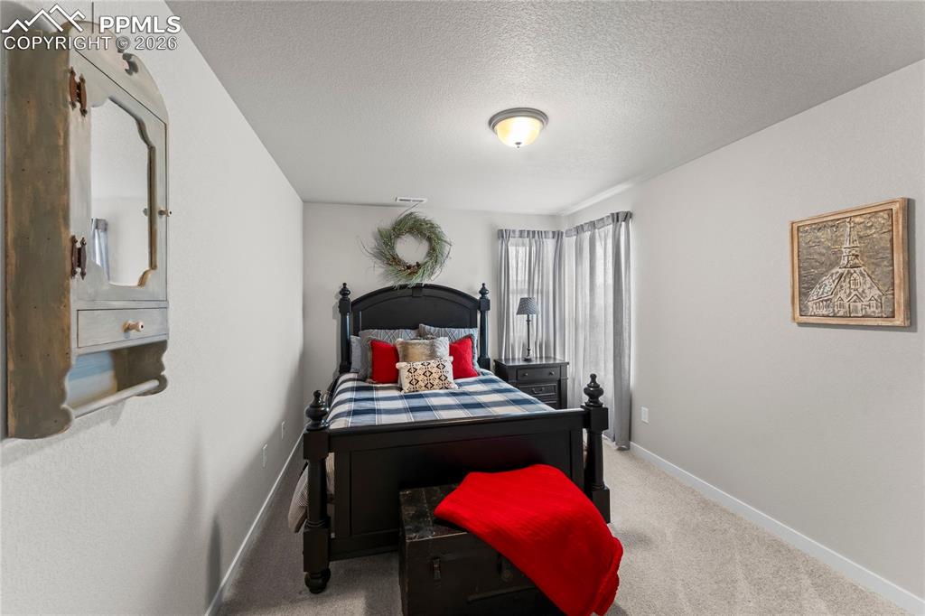 Image 25 of 46: Upstairs bedroom