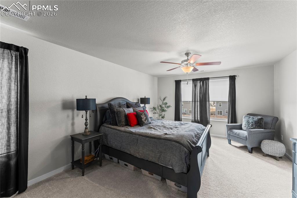 Image 27 of 46: Upstairs master suite