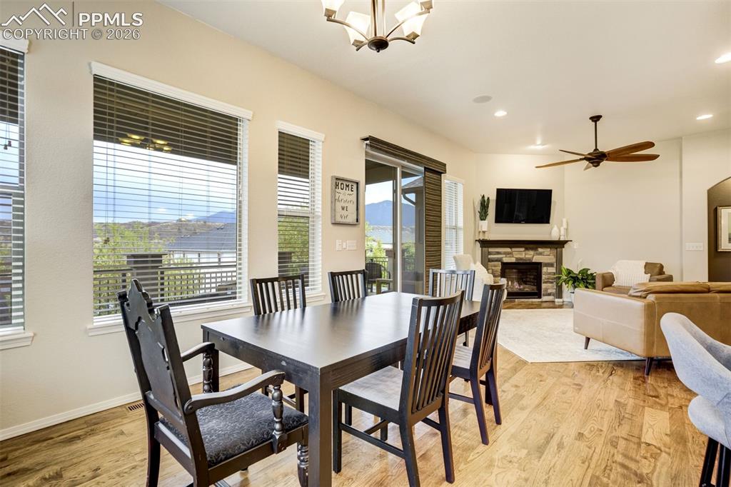 Image 19 of 48: Open-concept living area with hardwood flooring