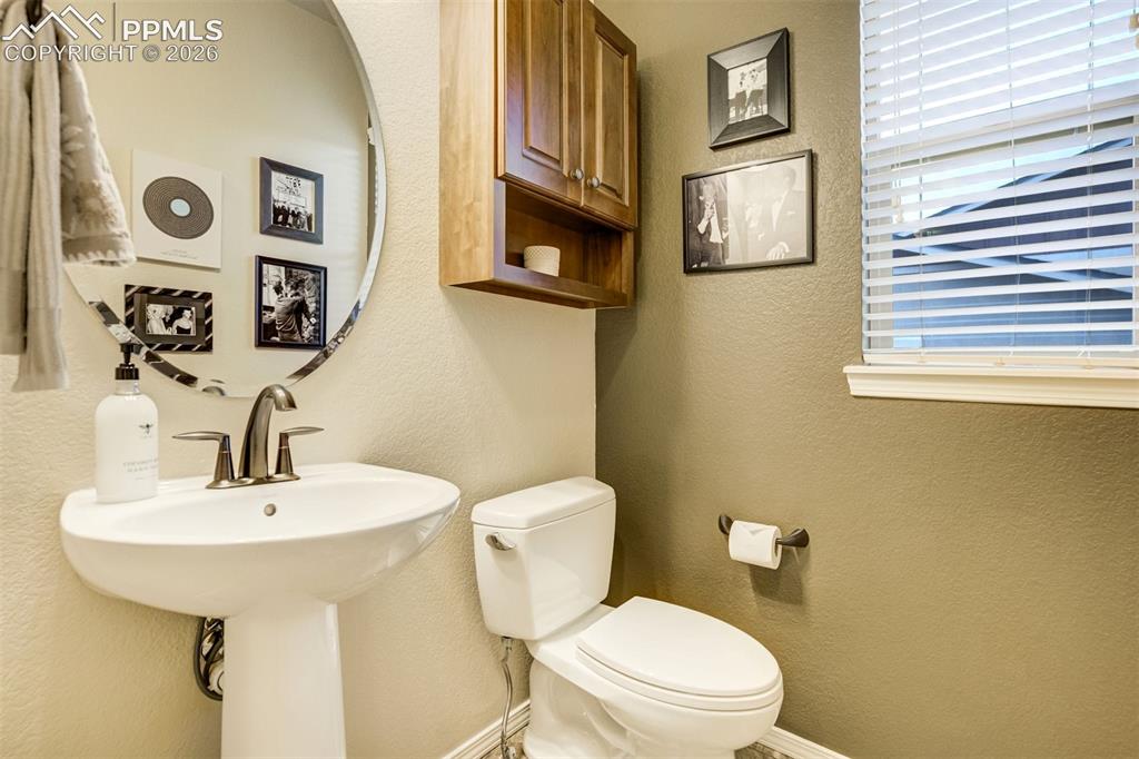 Image 23 of 48: Half bath on main level