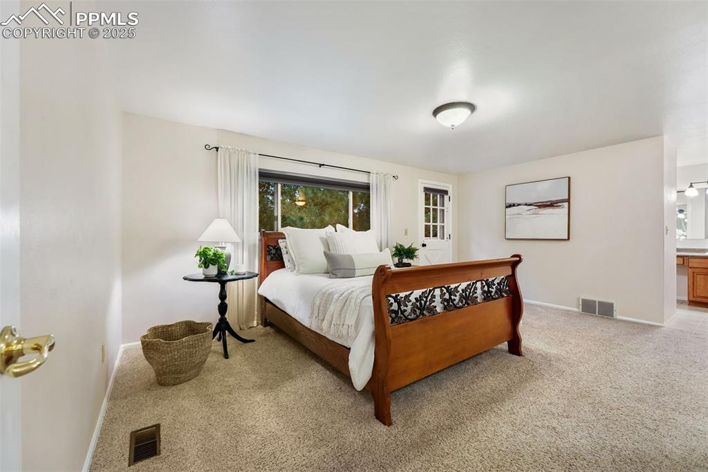 Image 21 of 50: Master Bedroom