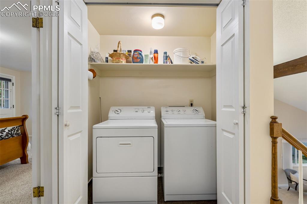 Image 29 of 50: Upstairs Laundry by bedrooms