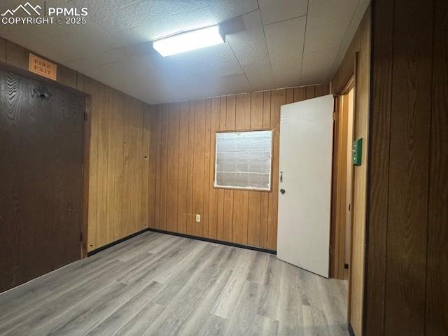 Image 13 of 19: Empty room featuring light wood-style  2611 Cflooring 2611 C