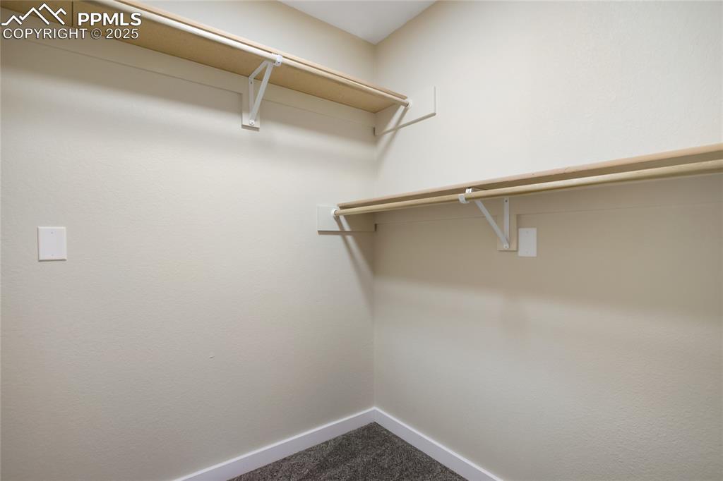 Image 19 of 37: Walk in Primary closet